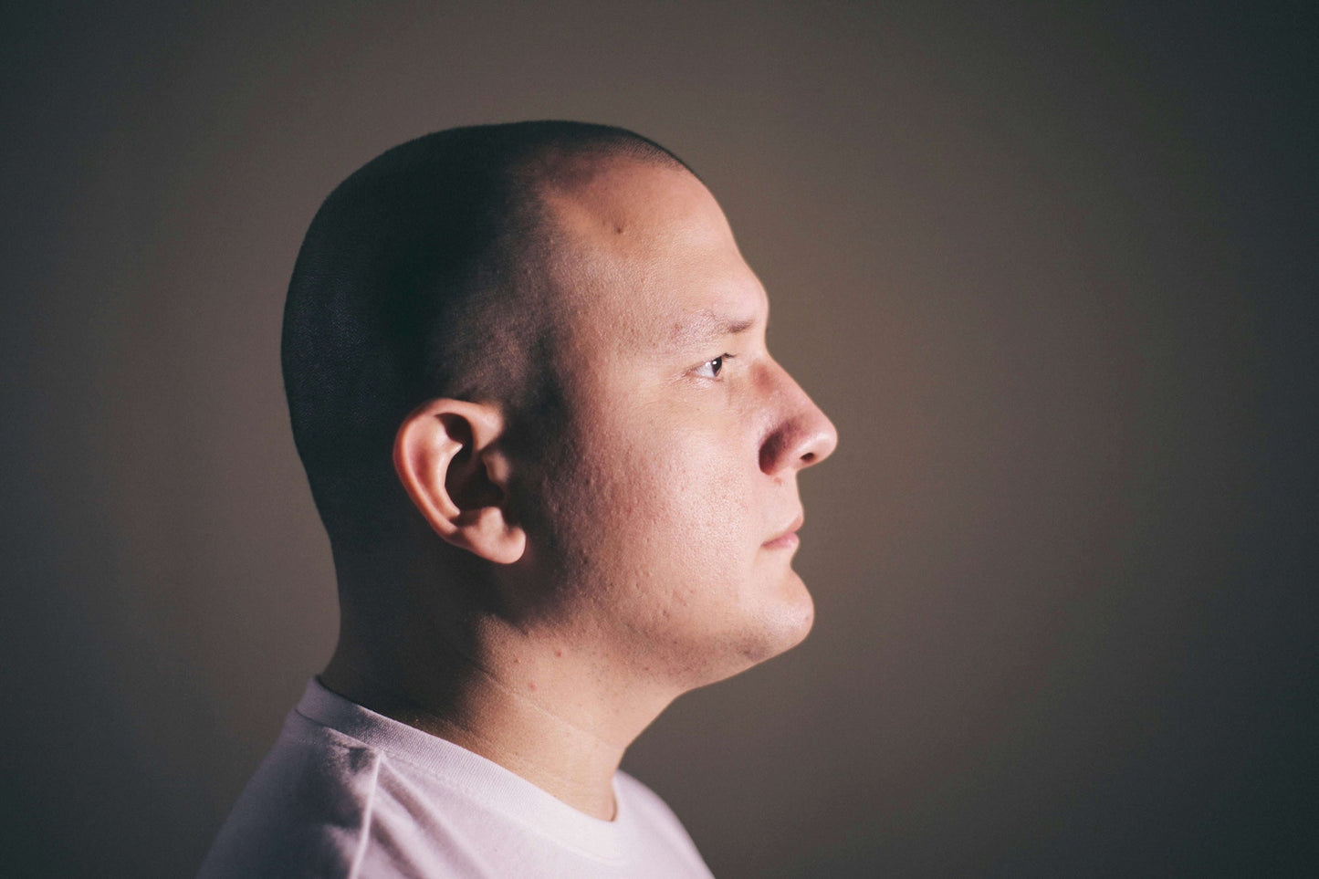 Side profile of bald man