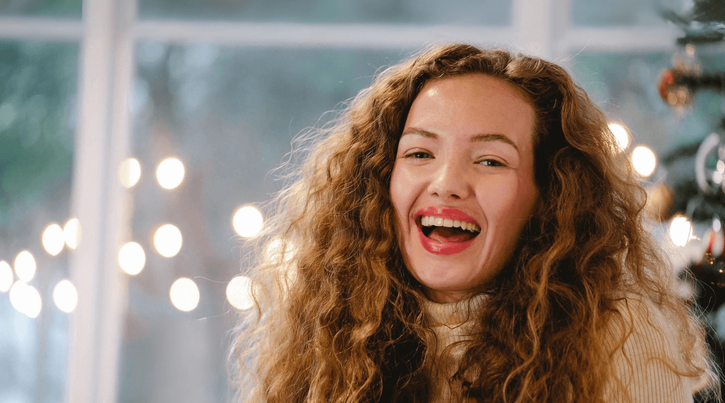 woman drinking at holiday party